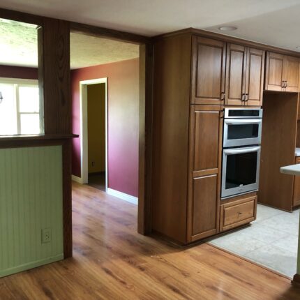 dated cabinets- this home needed a new look