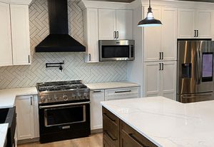 black hood over gas stove remodel